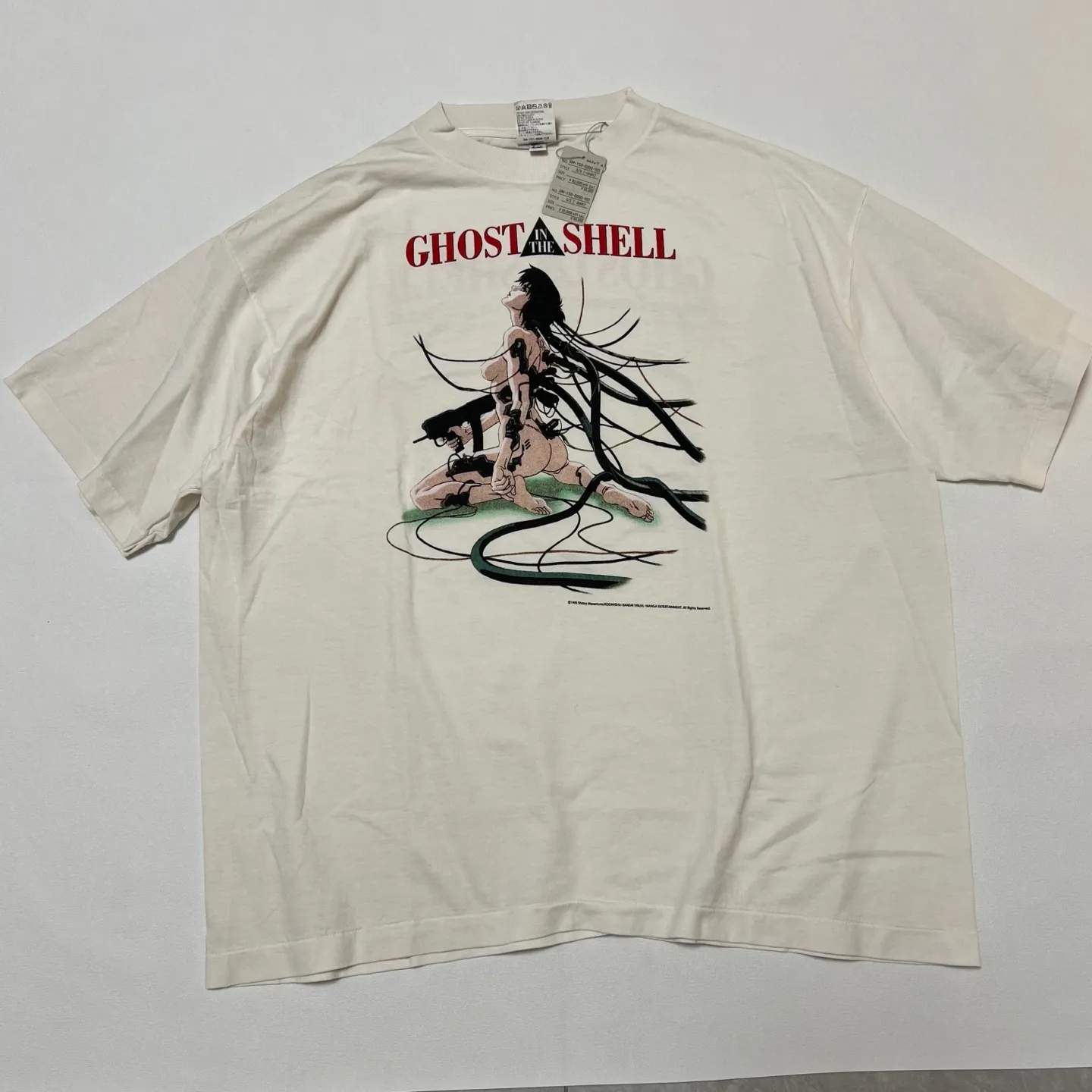 SAINT Mxxxxxx x GHOST IN THE SHELL ' GITS ' SS TEE/WHT Classic Big IP Ghost in the Shell co-branded Suzi Charge/Suzi Character TEE Off-white S-XL Cylindrical side seamless fabric 220g high gram weight OE yarn ⚠️Note: It is almost meaningless if it is not a cylindrical fabric Customized joint main mark/joint wash mark/little angel anti-counterfeiting label Original factory level printing factory Top purchasing agent level